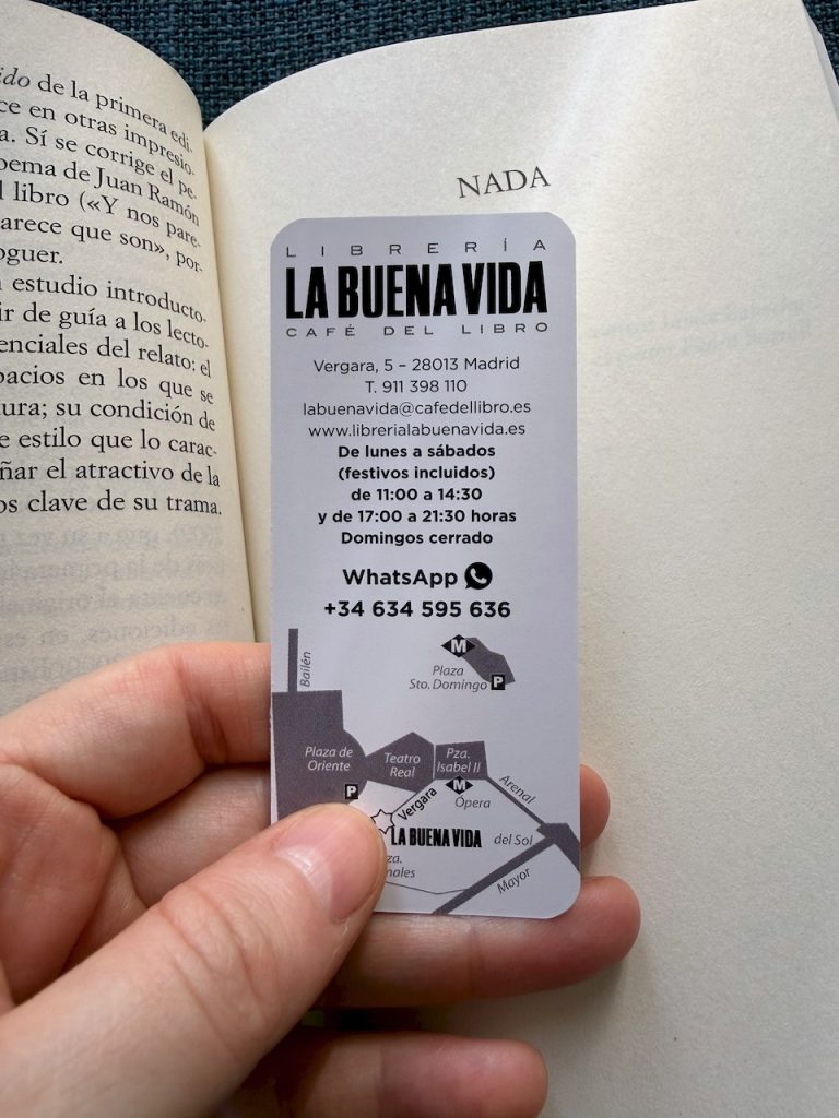 Back of bookmark from bookshop La Buena Vida in Madrid showing the address and contact details